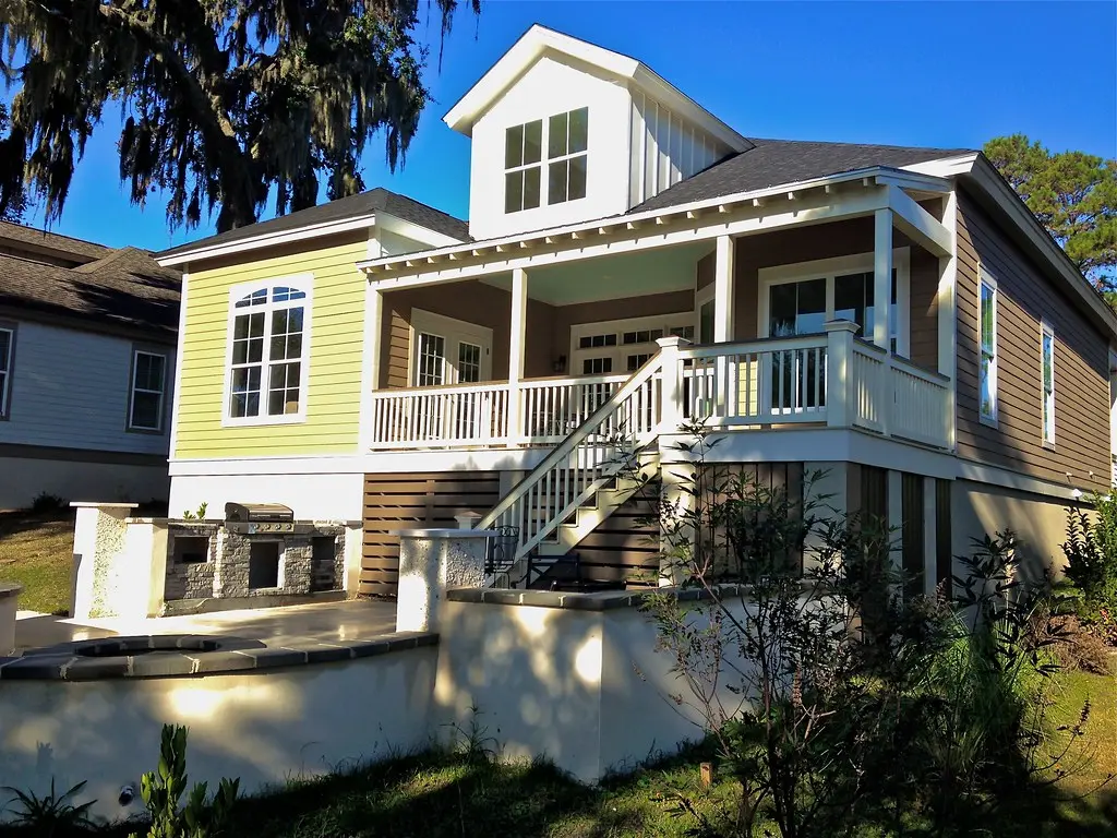 Rear and side elevation of a completed waterfront home in Sommer Lake Place